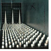Measurement of stochastic (wind) loadng on a high-rise building model in a small-scale boundary-layer wind tunnel